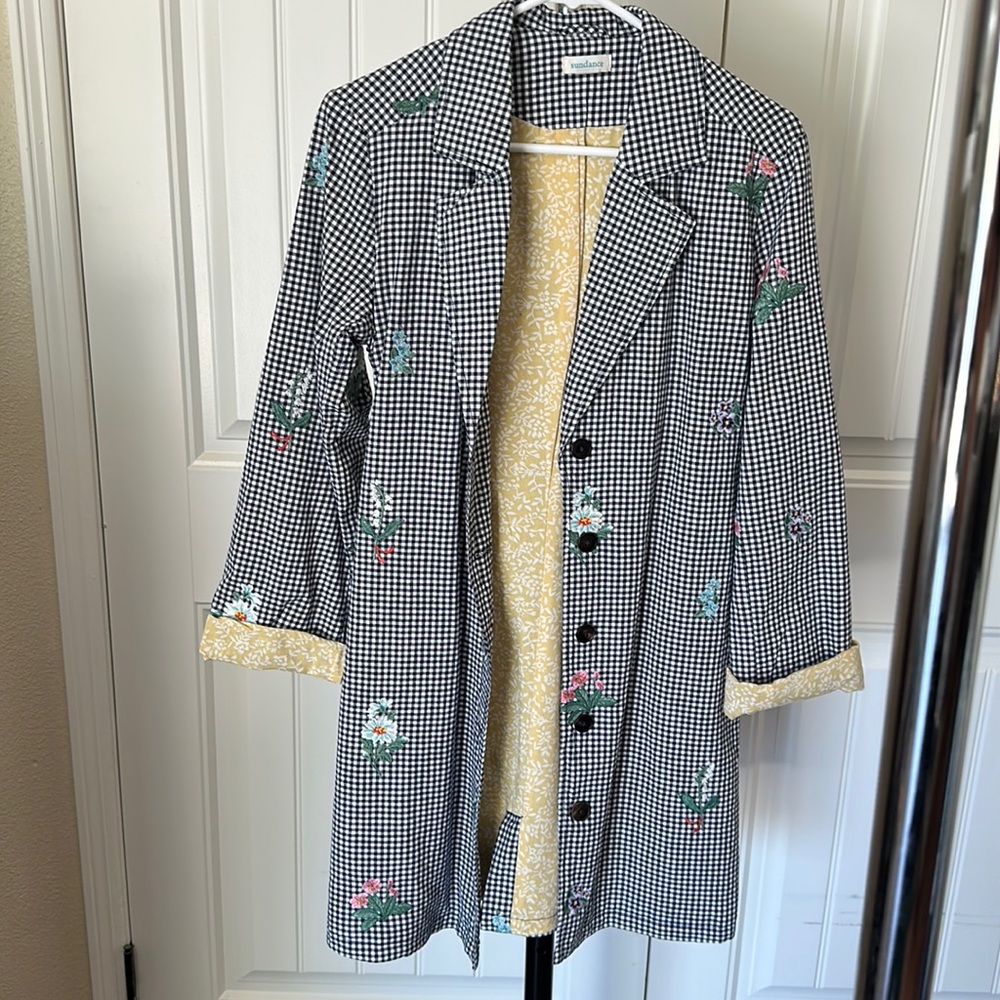 Brand is Sundance.  New without tags.  Lightweight coat. Navy check with flowers